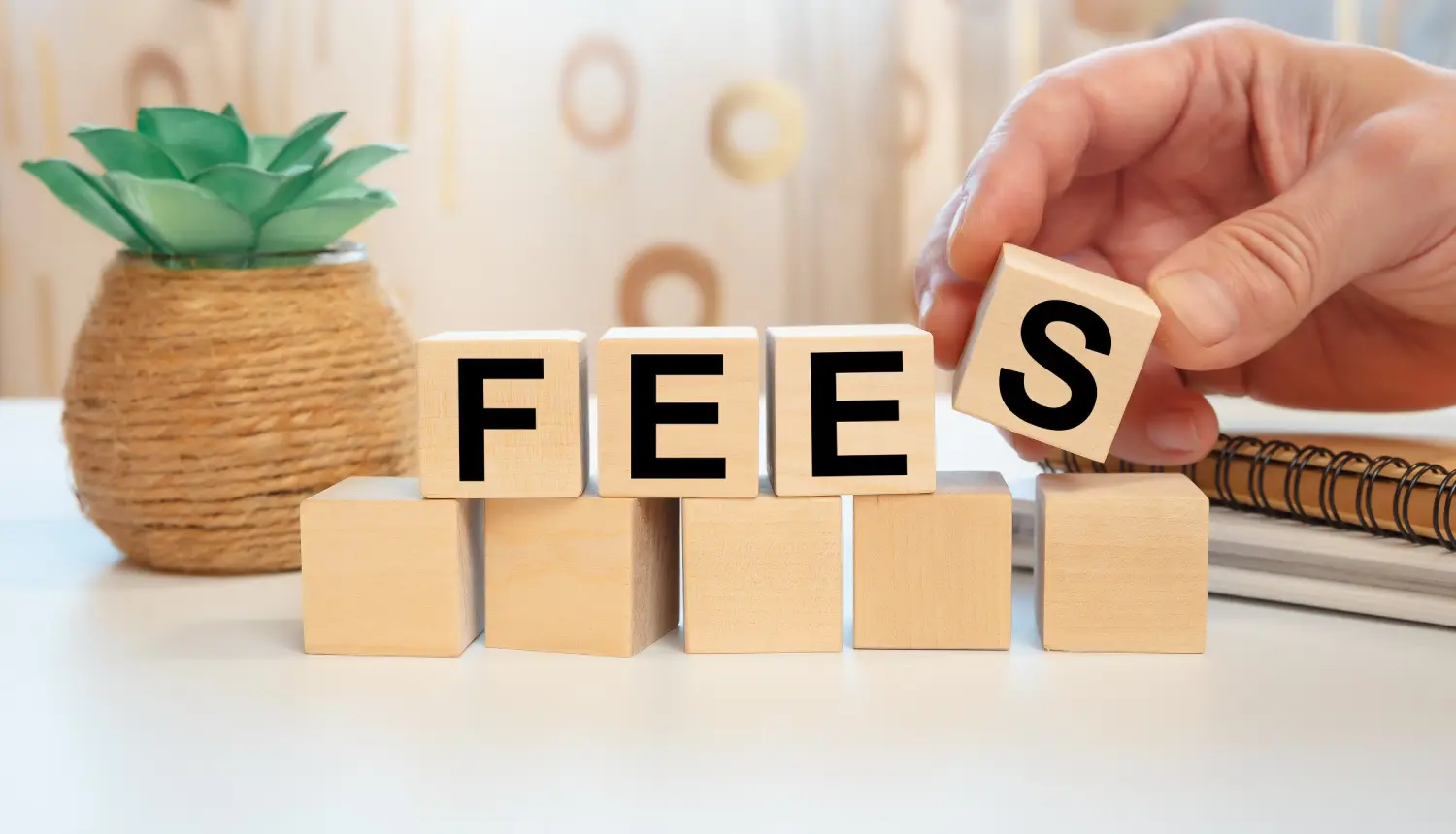 Calculator and paperwork representing fixed fee SMSF administration